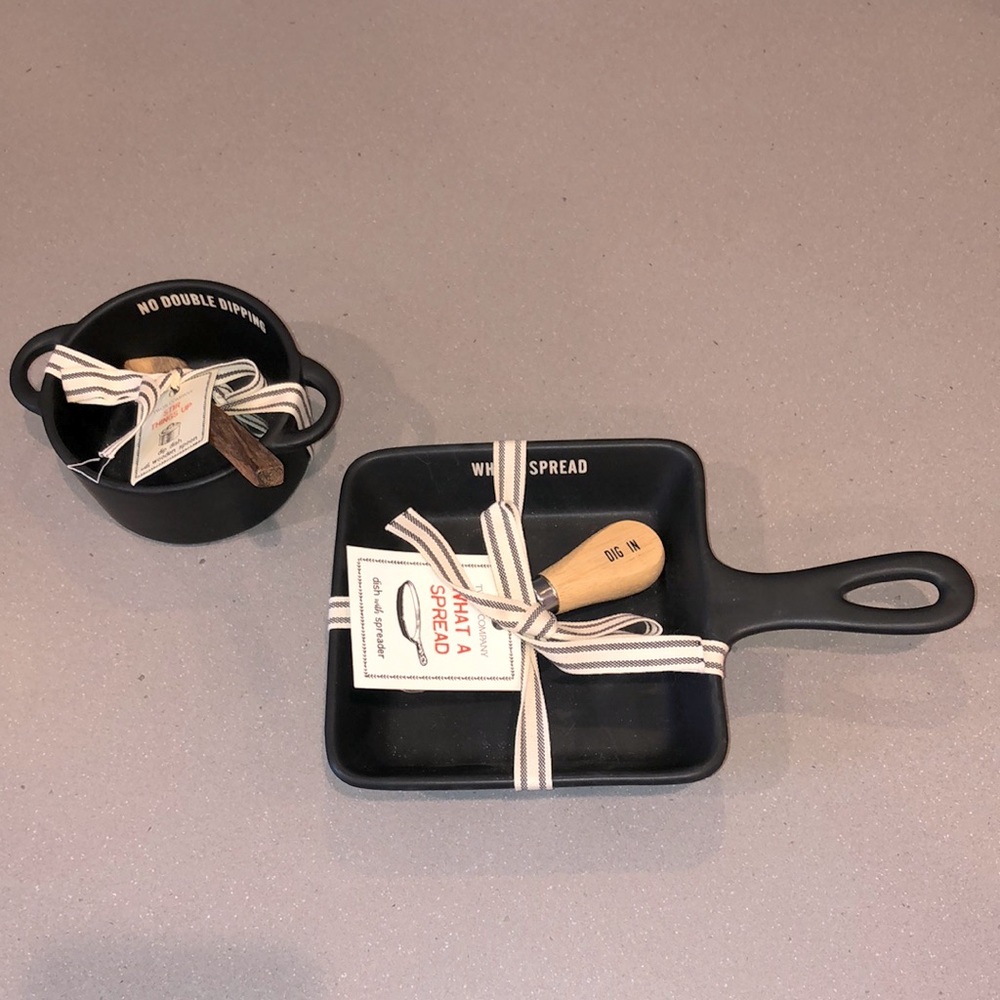 Two dip servers with utensils